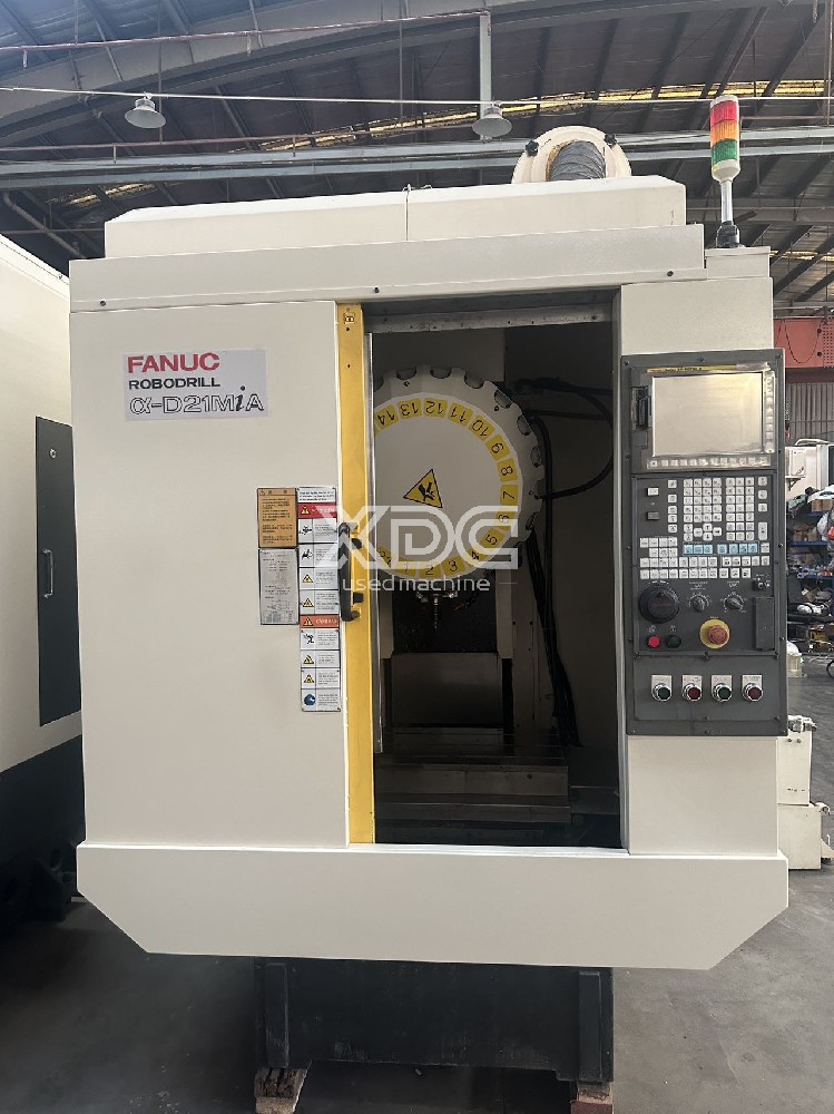 Used yellow Drilling & Tapping Center