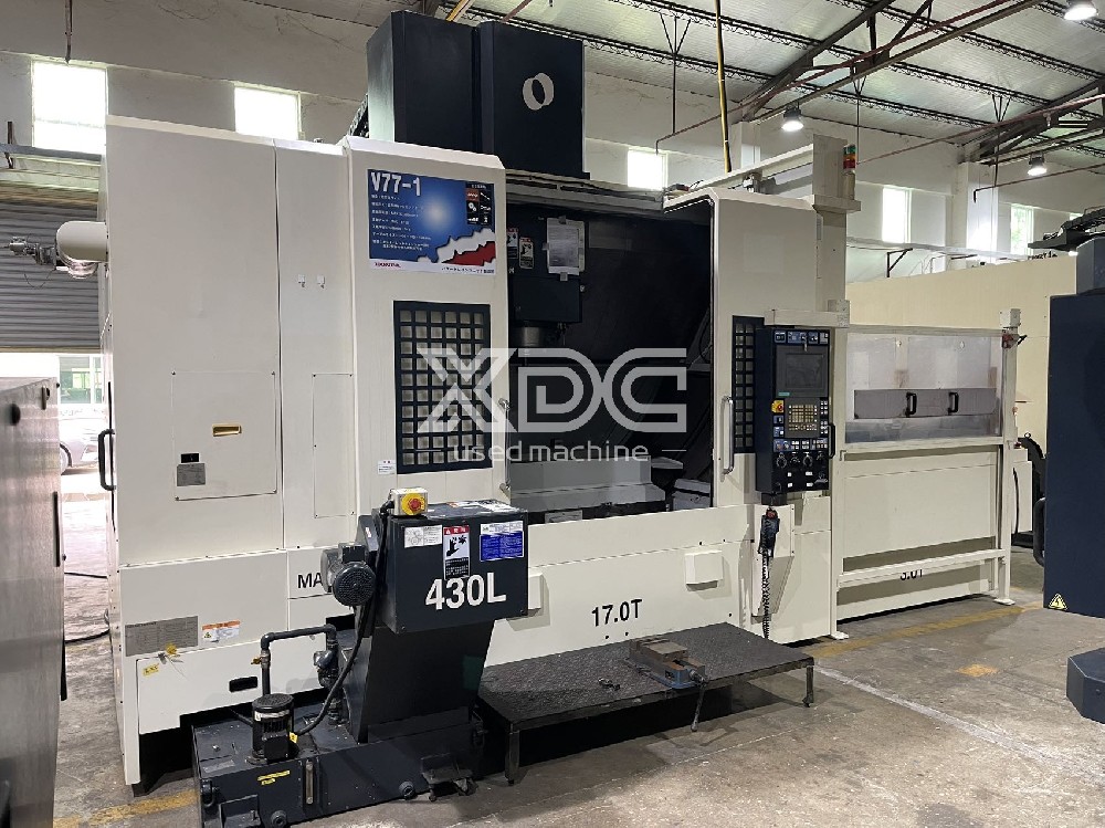 Used Makino V77 double-table vertical machining center.